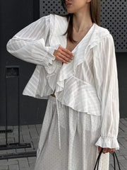 100% polyester Care instructions: Machine wash cold blouse in ivory with relaxed silhouette