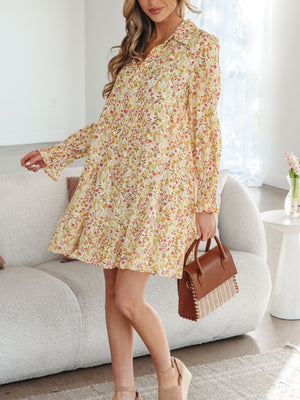 Floral print loose shirt dress with button-down front and long sleeves.