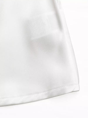 White maternity blouse with ruffled cold shoulder and tie belt detail