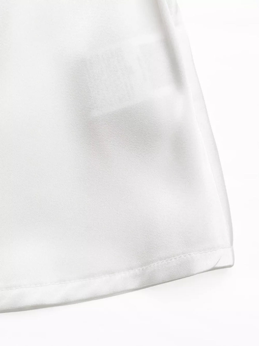 White maternity blouse with ruffled cold shoulder and tie belt detail