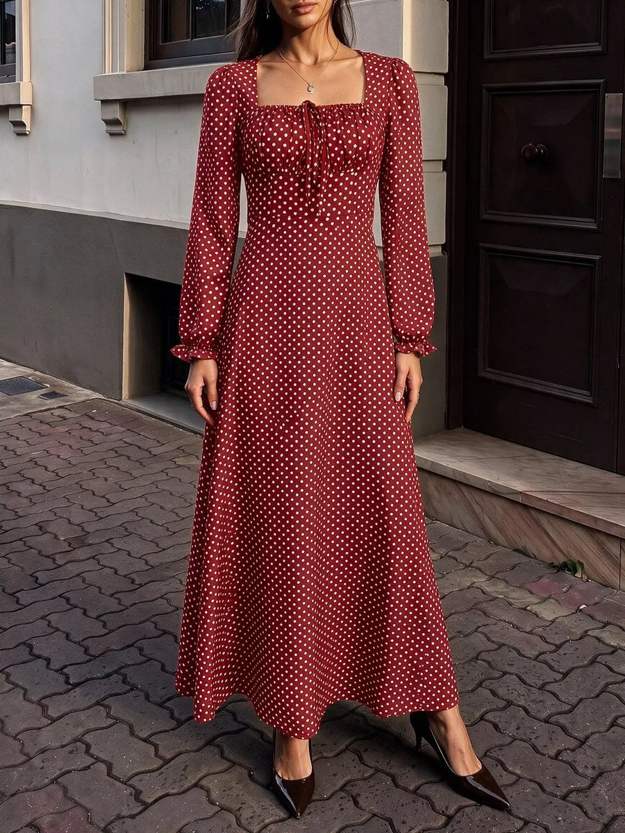 Red maxi dress featuring tied and polka dot