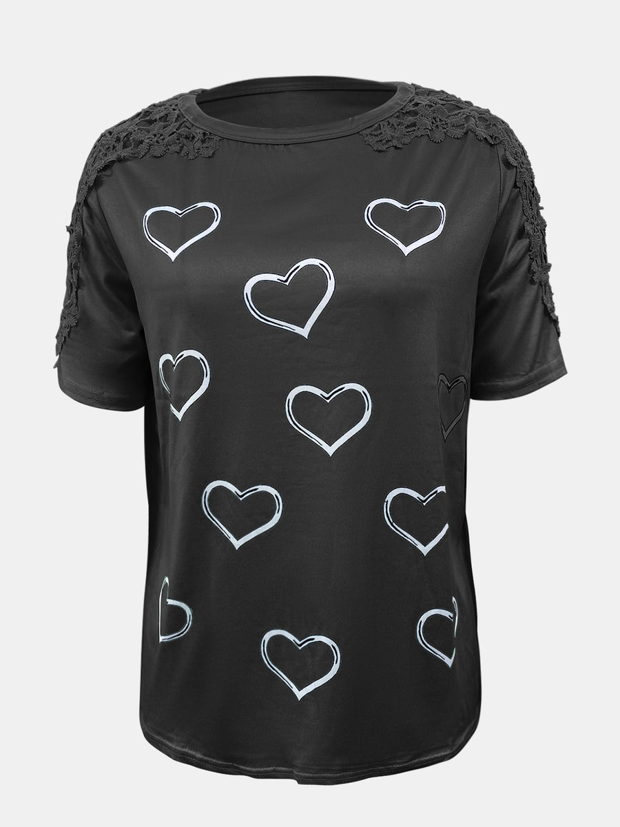 Black t-shirt with white heart print and lace trim on shoulders and sleeves.