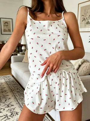 White ribbed cami and shorts set with a red floral print, featuring a square neckline and button detail.