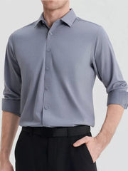 Men's light gray slim fit long sleeve button-down shirt with a spread collar.