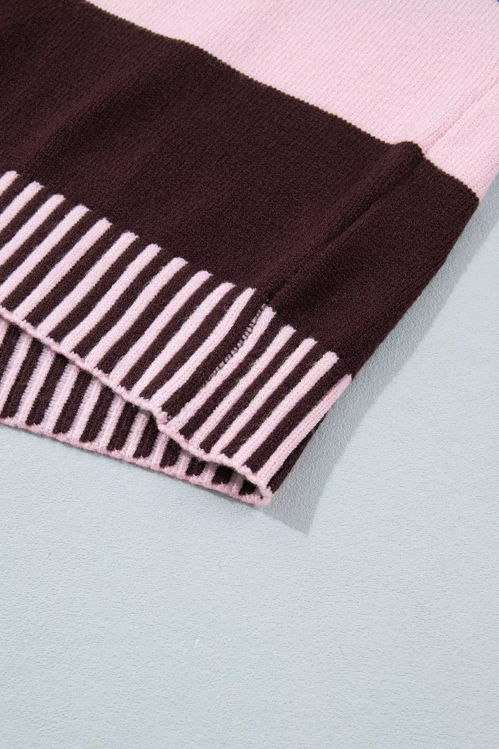 pullover sweater in baby pink with dropped shoulder and hip-length