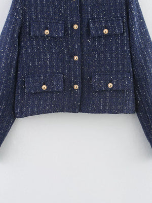 Dark blue cropped tweed button-up jacket with gold buttons and chest pockets.