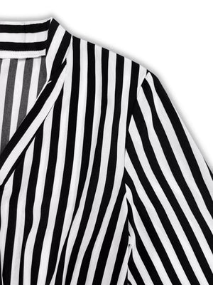 Notched long-sleeve midi dress in black and white stripes with a V-neckline.