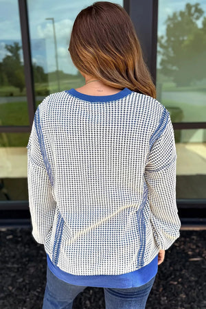 75% cotton, 25% polyester Care instructions: Machine wash cold sweatshirt in Royal Blue with relaxed silhouette