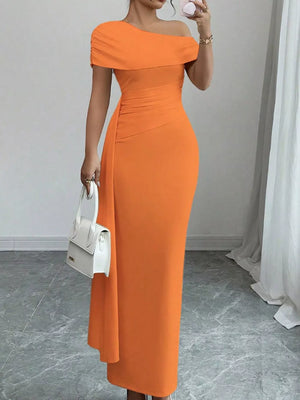 Orange asymmetrical ruched maxi dress with off-the-shoulder neckline and body-hugging fit.