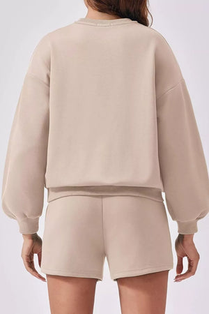 Tan sweatshirt with balloon sleeves and matching shorts, comfortable loungewear set.