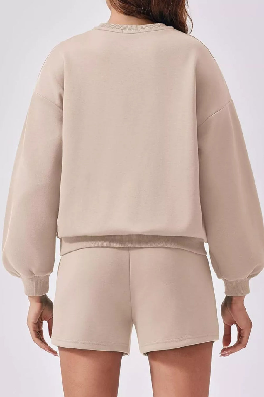 Tan sweatshirt with balloon sleeves and matching shorts, comfortable loungewear set.