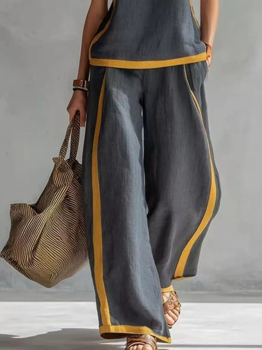 Dark gray sleeveless tank and wide-leg pants set with yellow trim, polyester.
