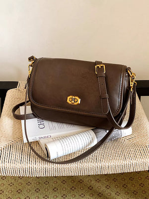 shoulder bag in Yellow with flap closure and small