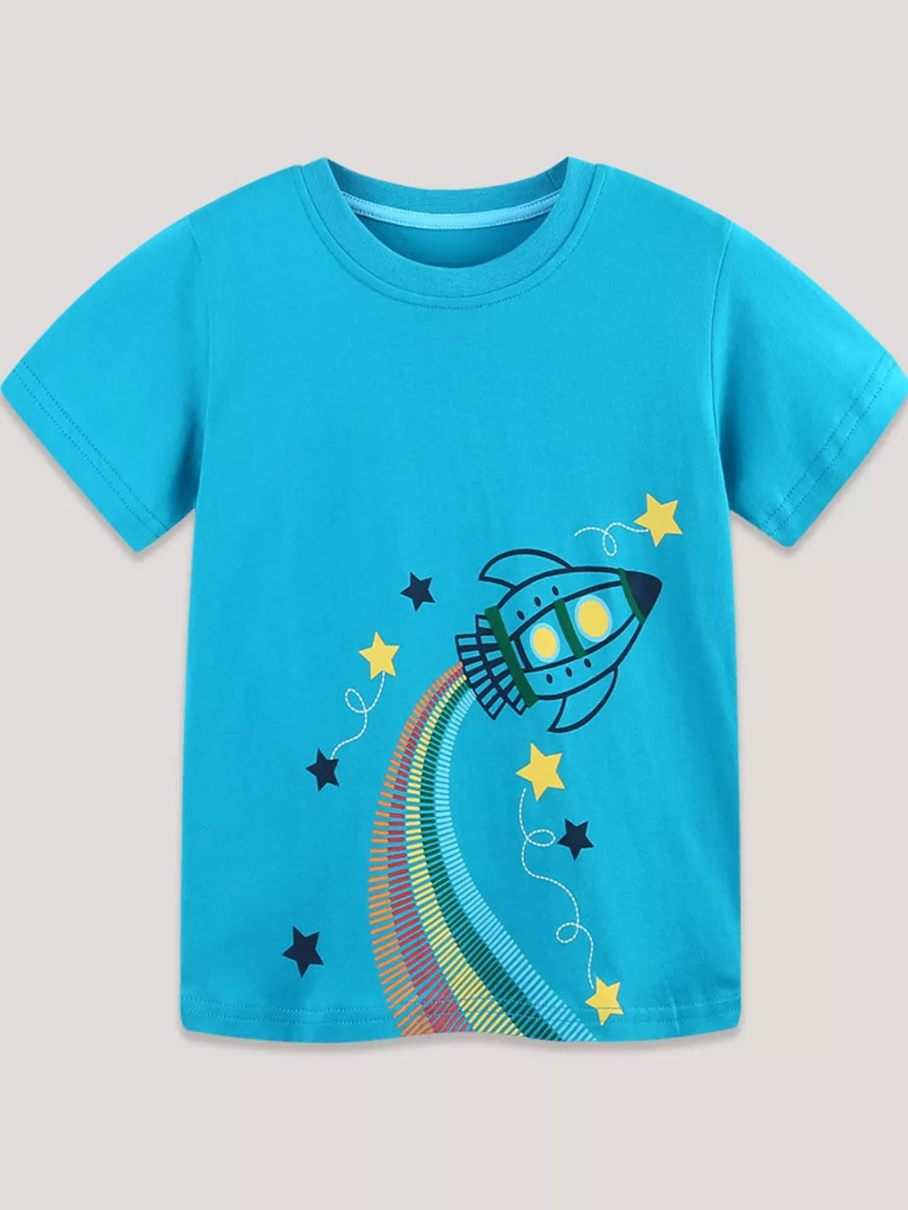 Blue cotton t-shirt with a playful rocket graphic and rainbow trail, perfect for toddlers.