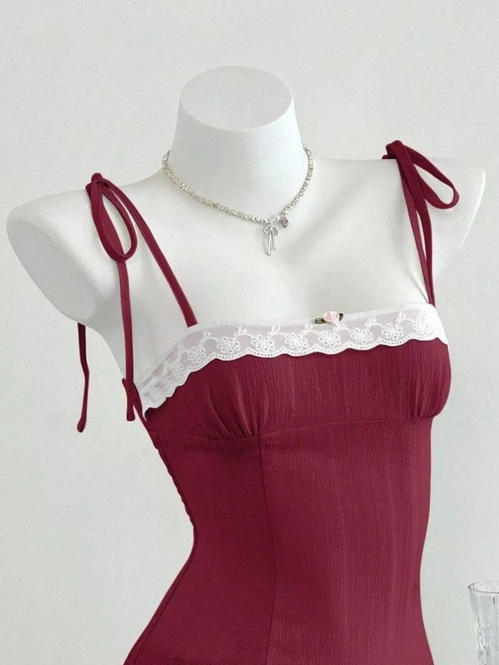 White camisole with tied and spaghetti strap