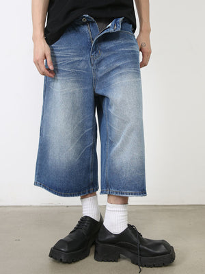 Blue wide leg cropped denim jeans with faded wash