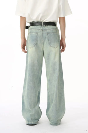 Seamed palazzo denim trousers in light wash, featuring a wide leg and casual styling.