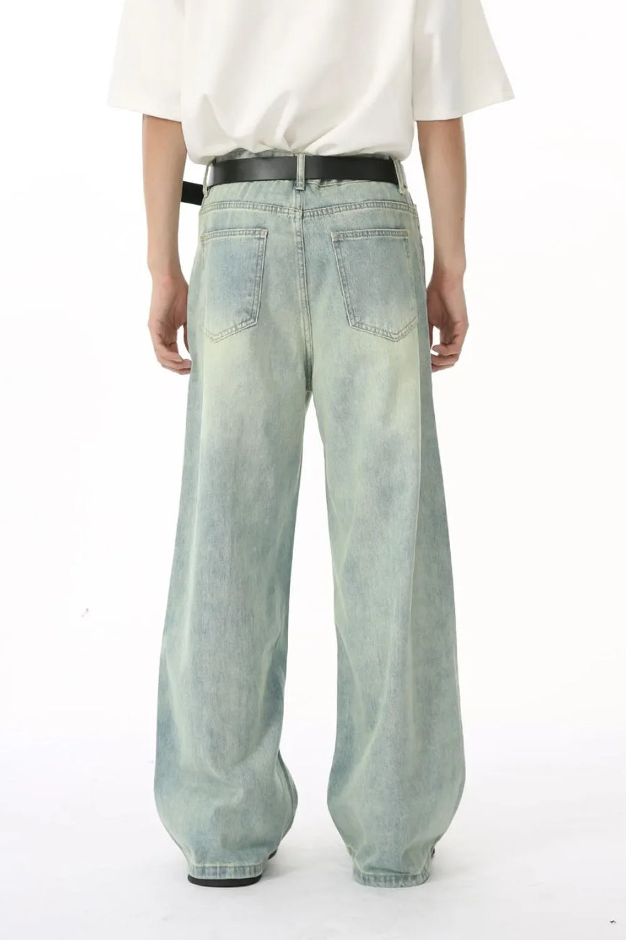 Seamed palazzo denim trousers in light wash, featuring a wide leg and casual styling.