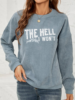 Textured corduroy crewneck sweatshirt in French Blue with graphic text and floral detail.