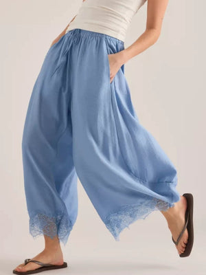 wide-leg pants in sky blue featuring drawstring and loose fit