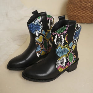 Python print western booties in snakeskin with colorful accents.
