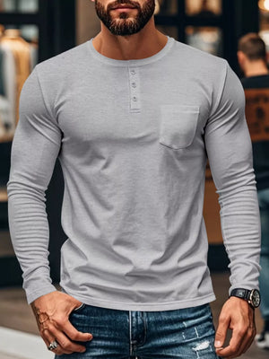 Light gray long sleeve henley t-shirt with button placket and chest pocket.