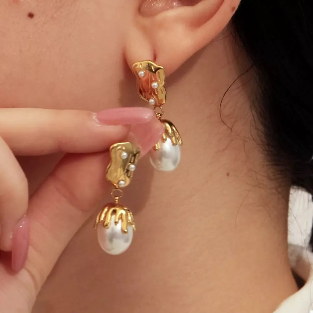 earrings in gold featuring drop design and straight fit