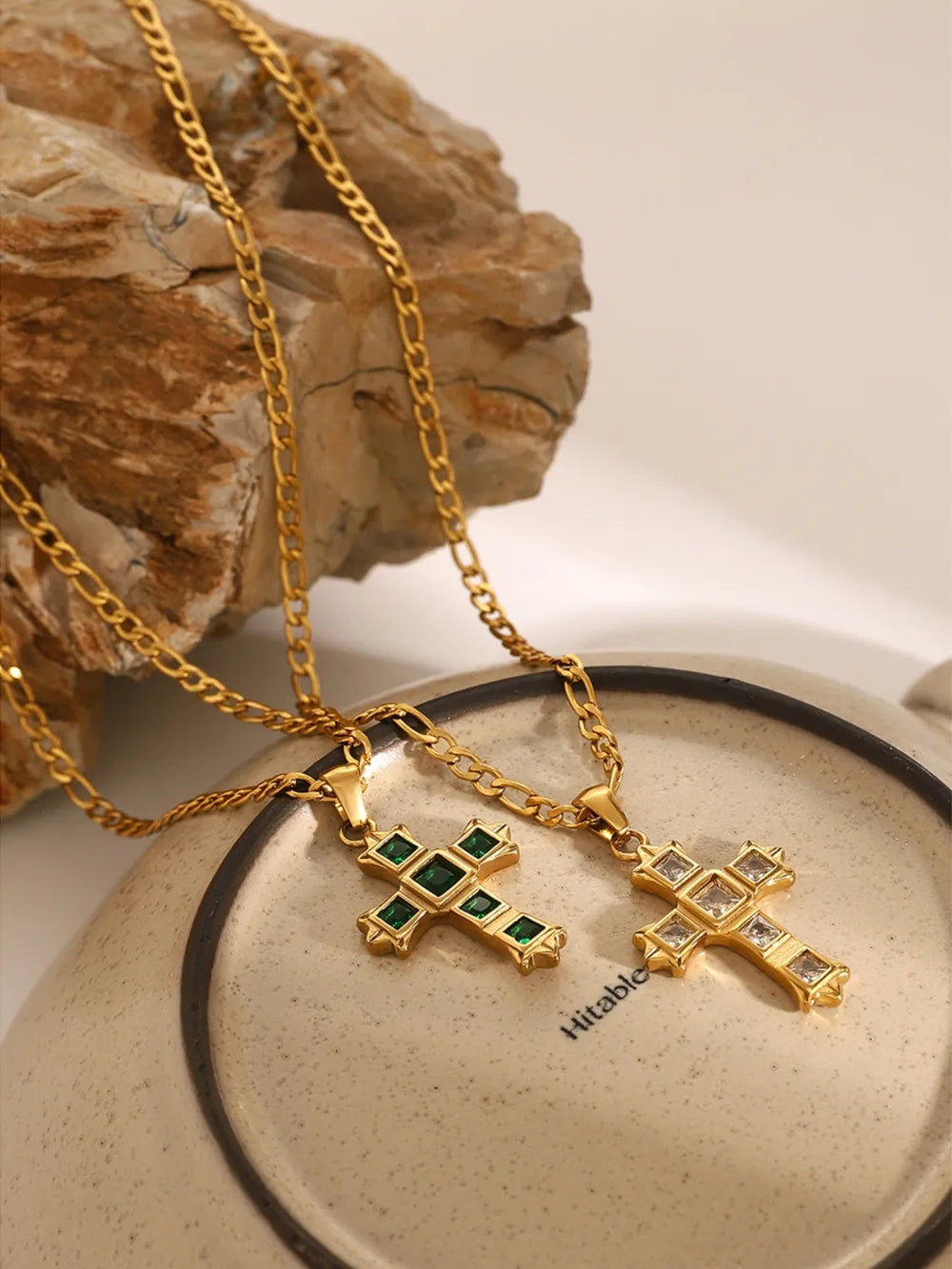 Emerald & Zirconia Cross Pendant necklaces with gold chains.