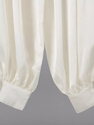 High-waisted Satin Balloon Pants in Cream with pocketed