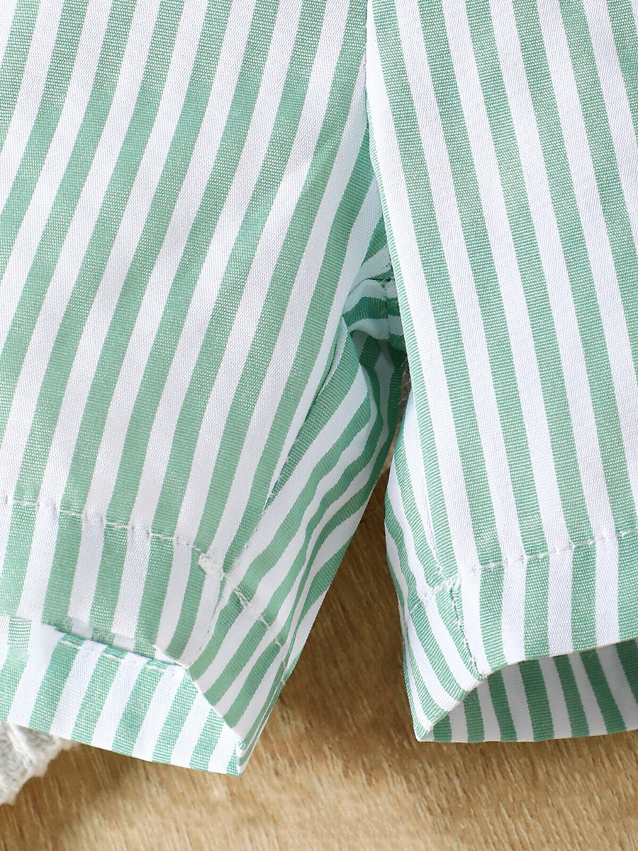Green and white striped cotton shorts with rolled cuffs.