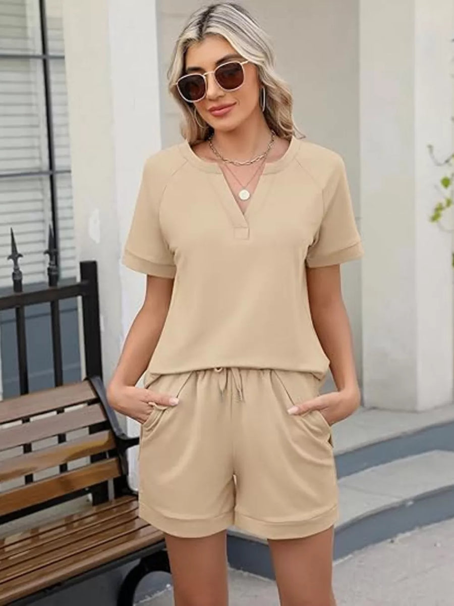 Apricot two-piece set with drawstring shorts and v-neck tee.