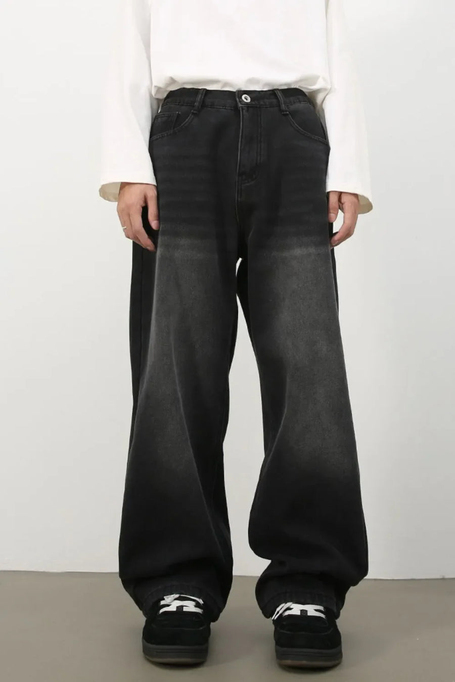 Oversized dark fade wash denim jeans with a wide leg