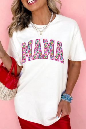 White graphic t-shirt with floral "MAMA" text, crew neck, short sleeves.