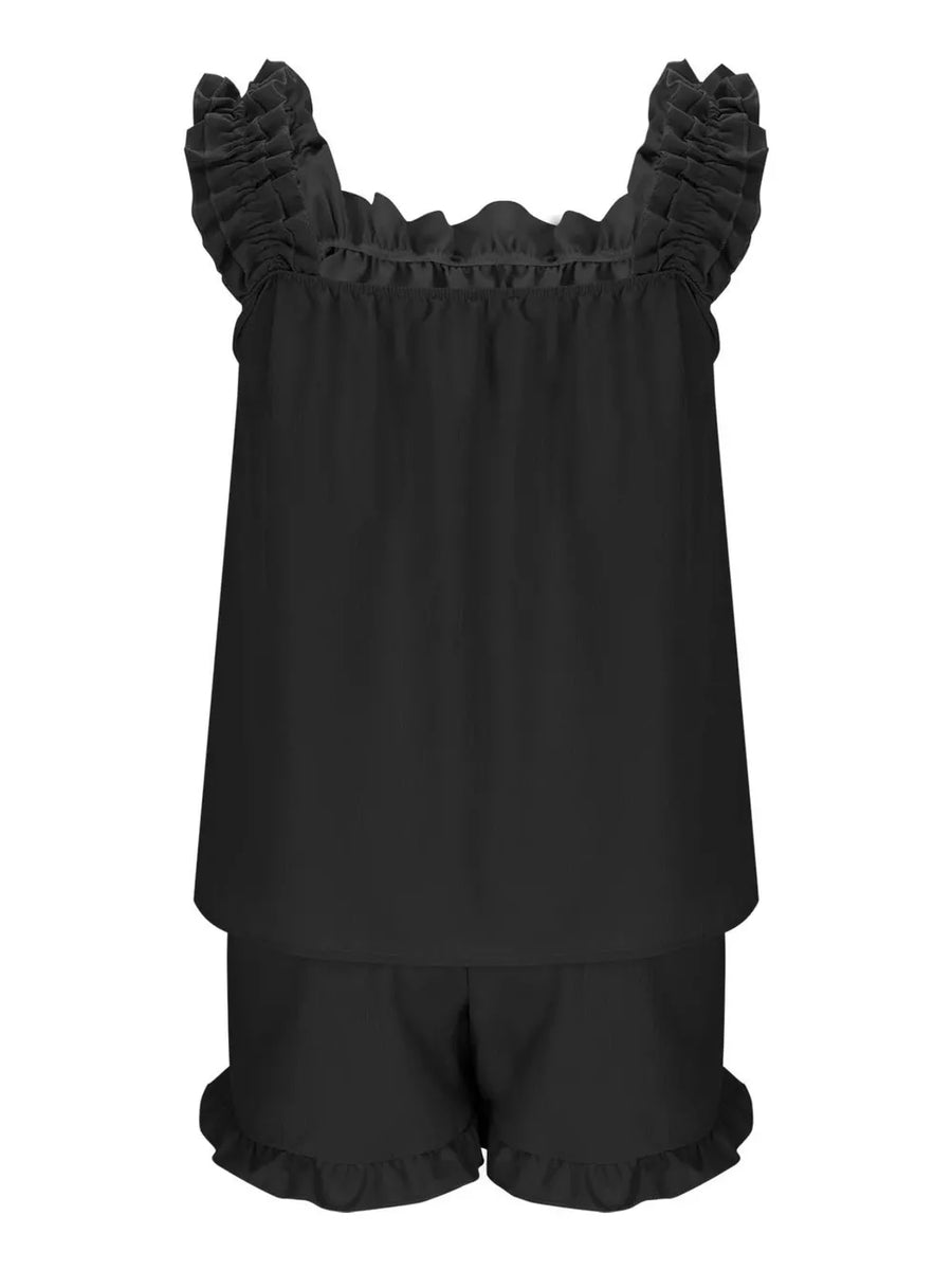 Black ruffled pajama set with square neckline and ruffled shorts.
