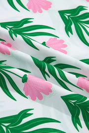 White polyester blouse with pink floral and green leaf print