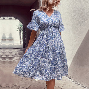 Light blue ditsy floral tiered midi dress with v-neck and tie waist