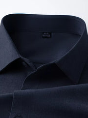 Navy long sleeve men's dress shirt with button-down collar detail