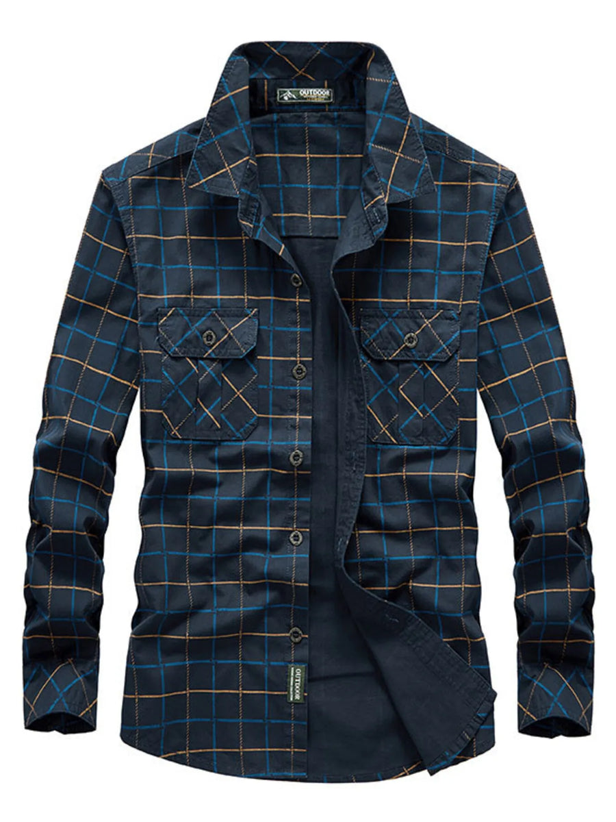 Plus-size casual long-sleeve shirt in black blue plaid with buttoned chest pockets.