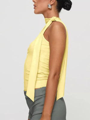 Yellow sleeveless halter top with tie detail