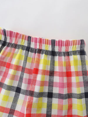Baby shorts with elastic waistband in colorful plaid pattern