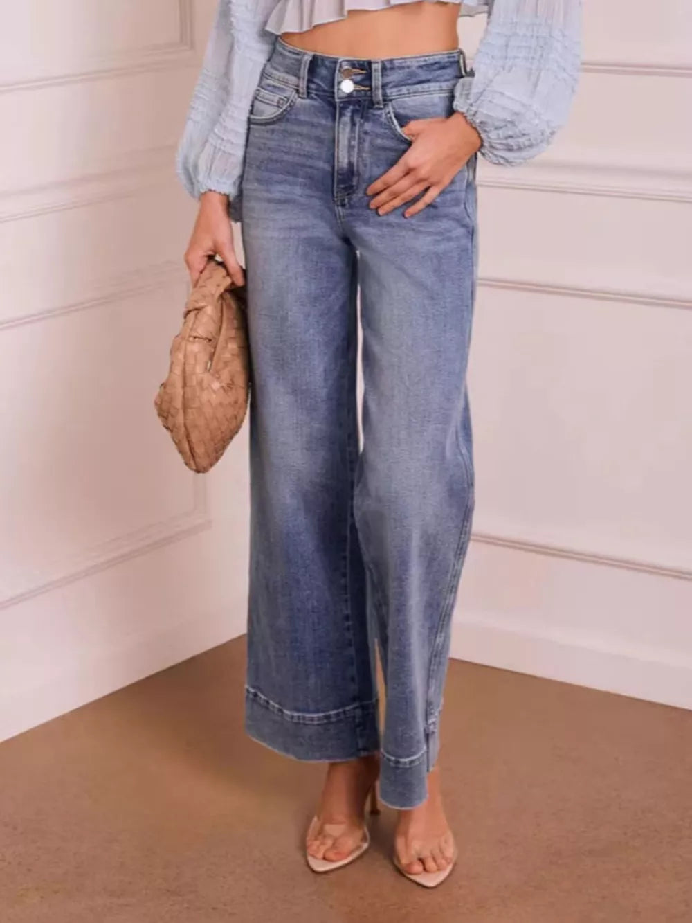 wide-leg jeans in medium blue featuring buttoned and flared fit