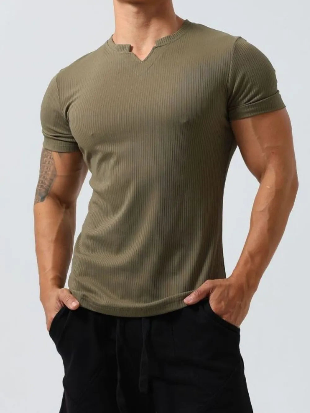 Textured ribbed V-neck muscle tee in moss green with short sleeves and a slim fit.