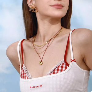 necklace in gold featuring layered and layered fit