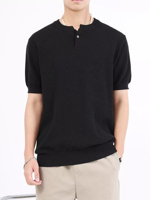 Men's black knitted henley with short sleeves and a two-button placket.