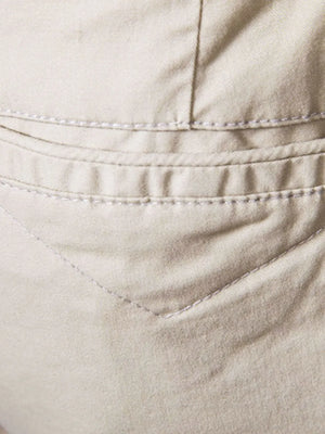 Khaki chino shorts detail with double-stitched pocket and relaxed fit.
