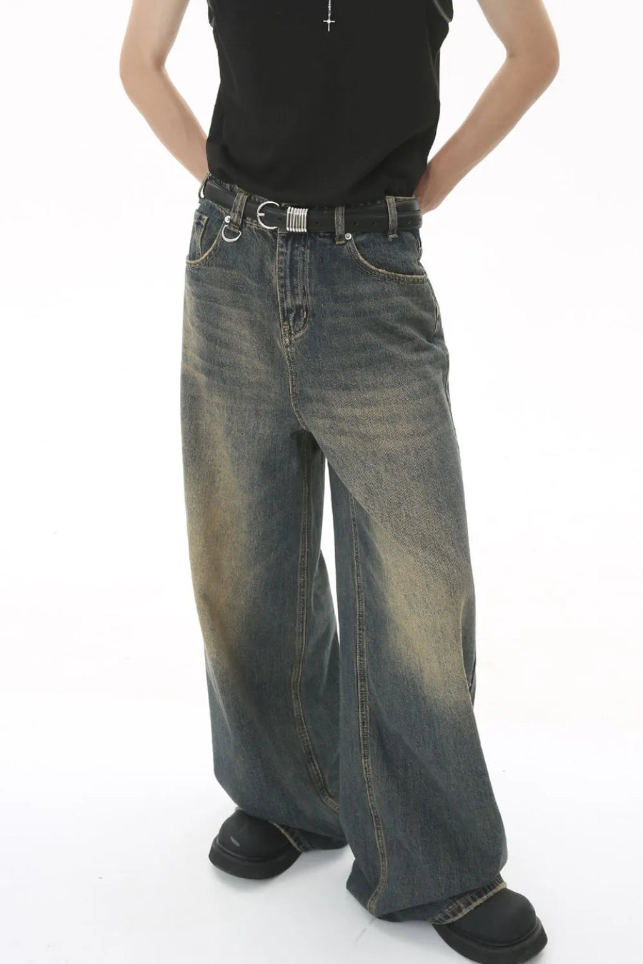 Faded wash palazzo denim trousers in medium blue, featuring a relaxed fit and wide leg.