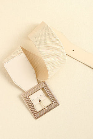 Ivory elasticated belt with textured square buckle and faux leather accents