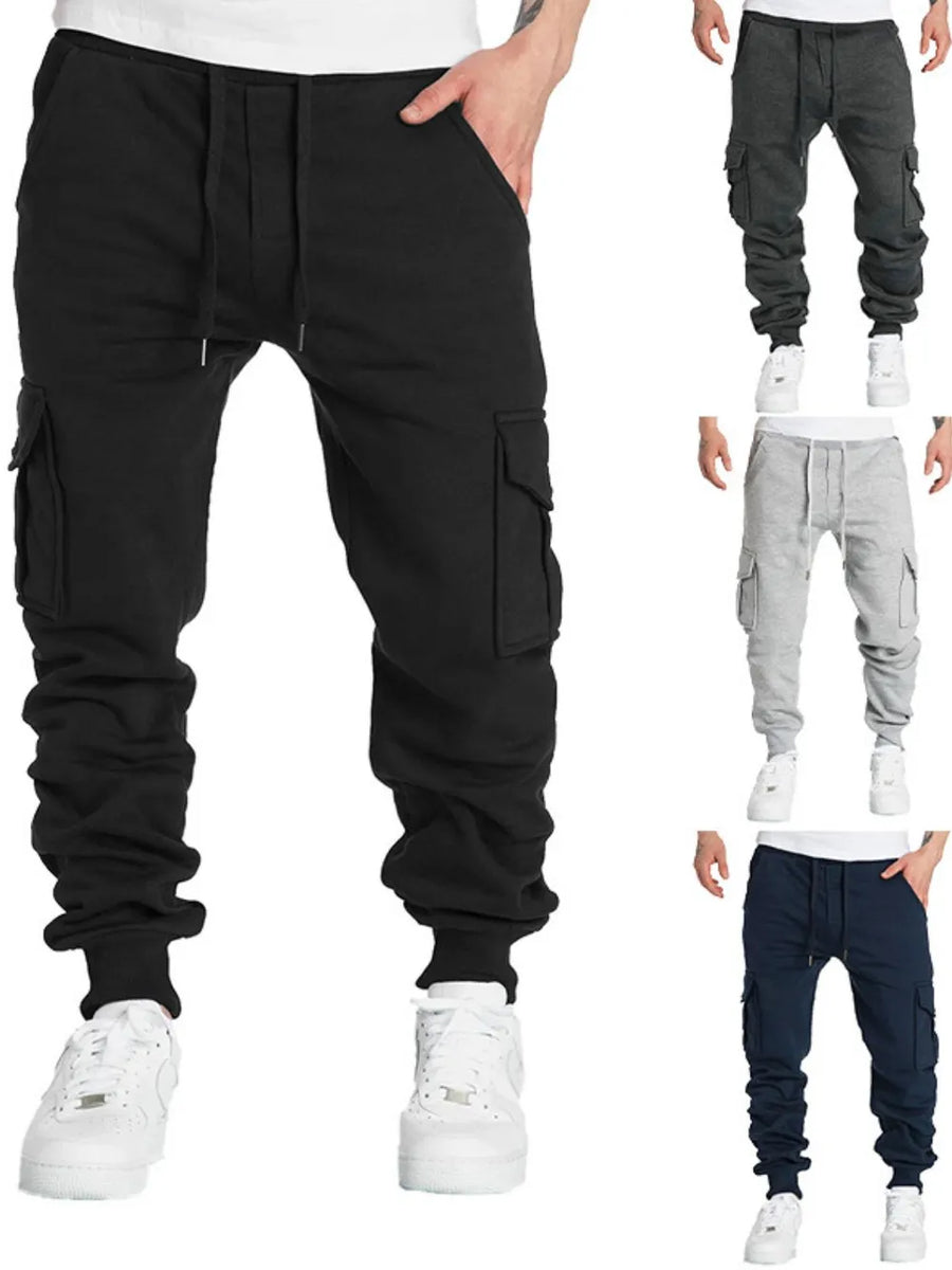 Black cargo pocket cuffed joggers with drawstring waist and elastic cuffs.