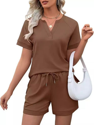 Brown two-piece set with V-neck top and drawstring shorts with pockets.
