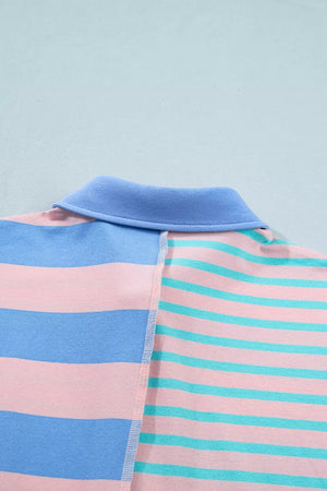 Striped polo shirt with blue collar and pink, blue, and teal stripes